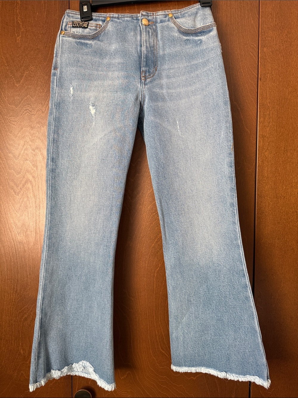 Versace Jeans Couture Sz US 24. Ret $300 NWT. Flare, Raw Hem Lightly Distressed